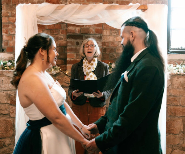 Delivering a reading for Matt and Georgie